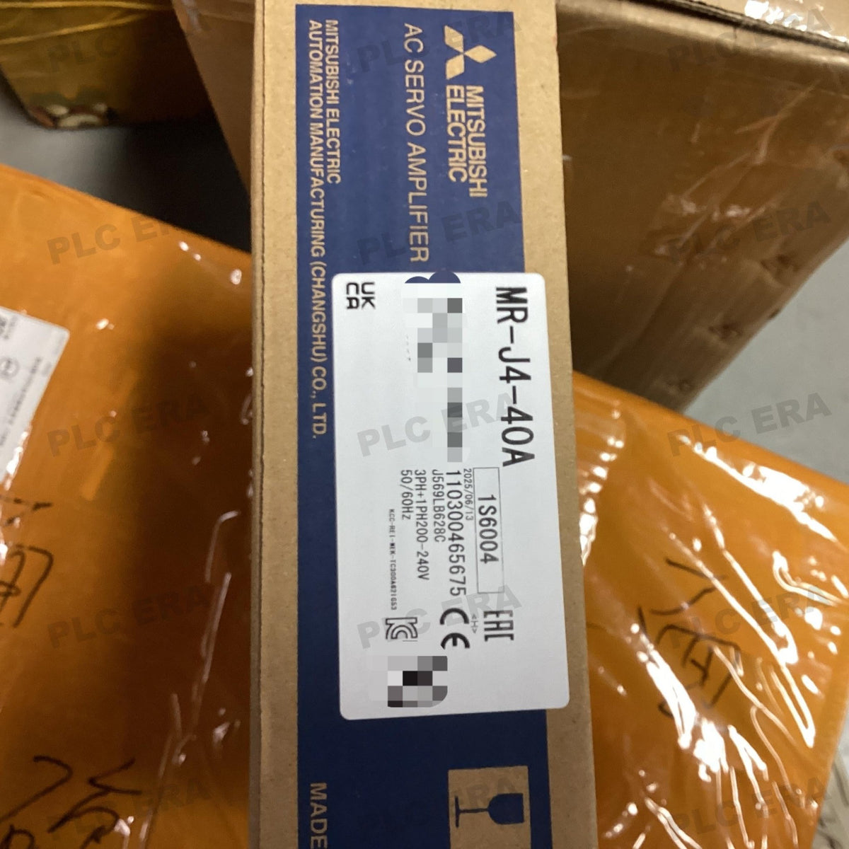 PLC ERA warehouse stocked with Original New Mitsubishi Electric MR-J4-40A and industrial automation modules ready for global shipping