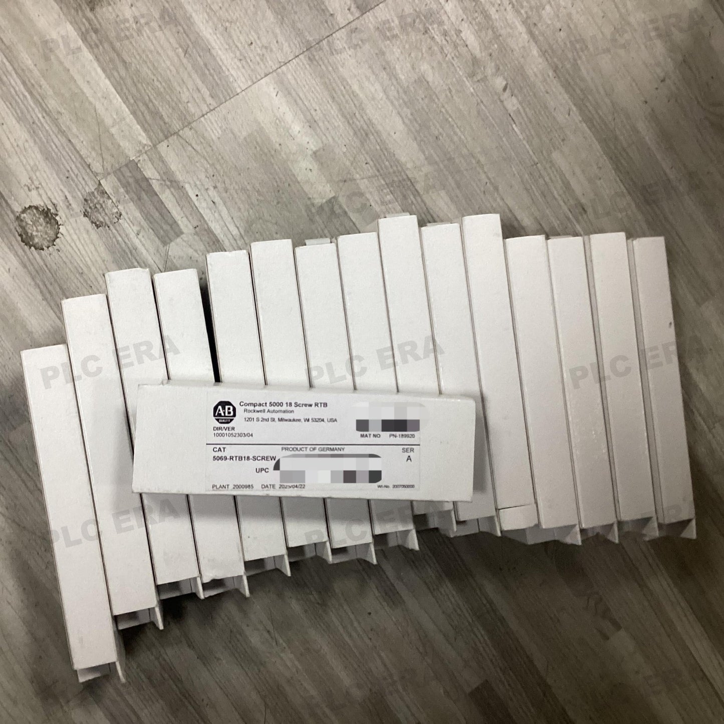 PLC ERA warehouse stocked with Original New Allen-Bradley 5069-RTB18-SCREW and industrial automation modules ready for global shipping
