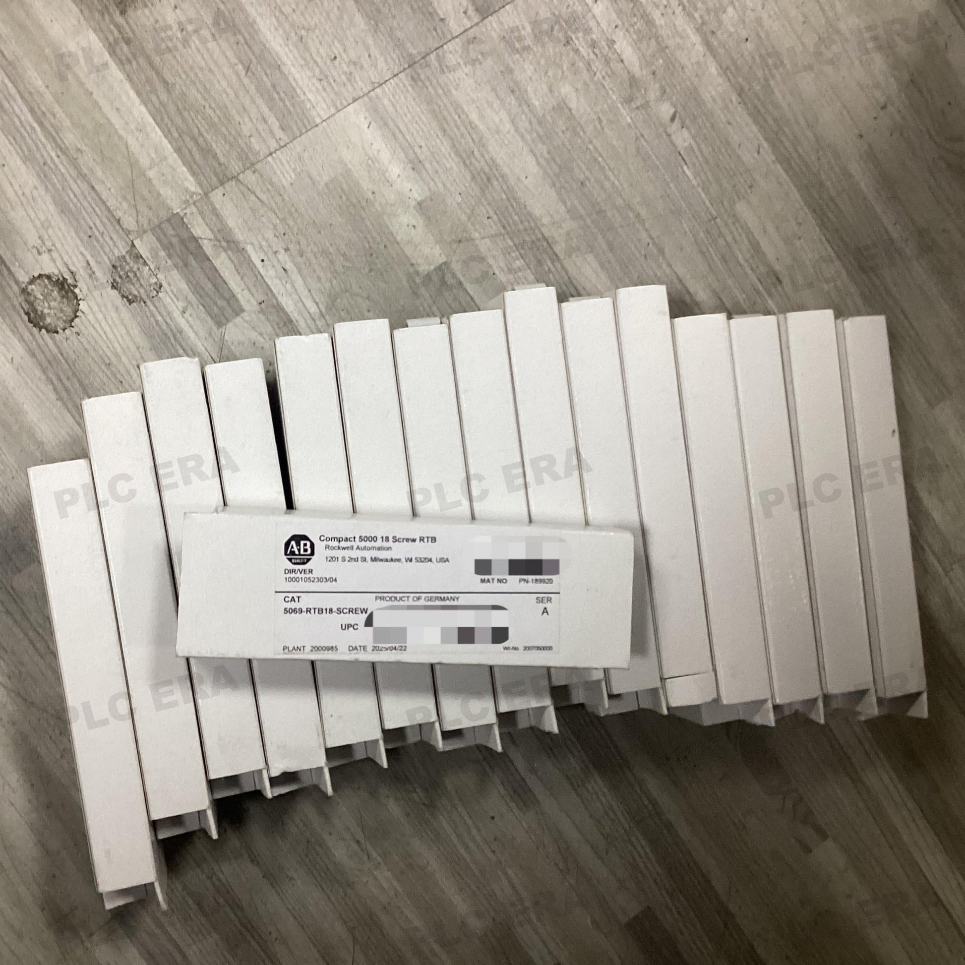 PLC ERA warehouse stocked with Original New Allen-Bradley 5069-RTB18-SCREW and industrial automation modules ready for global shipping