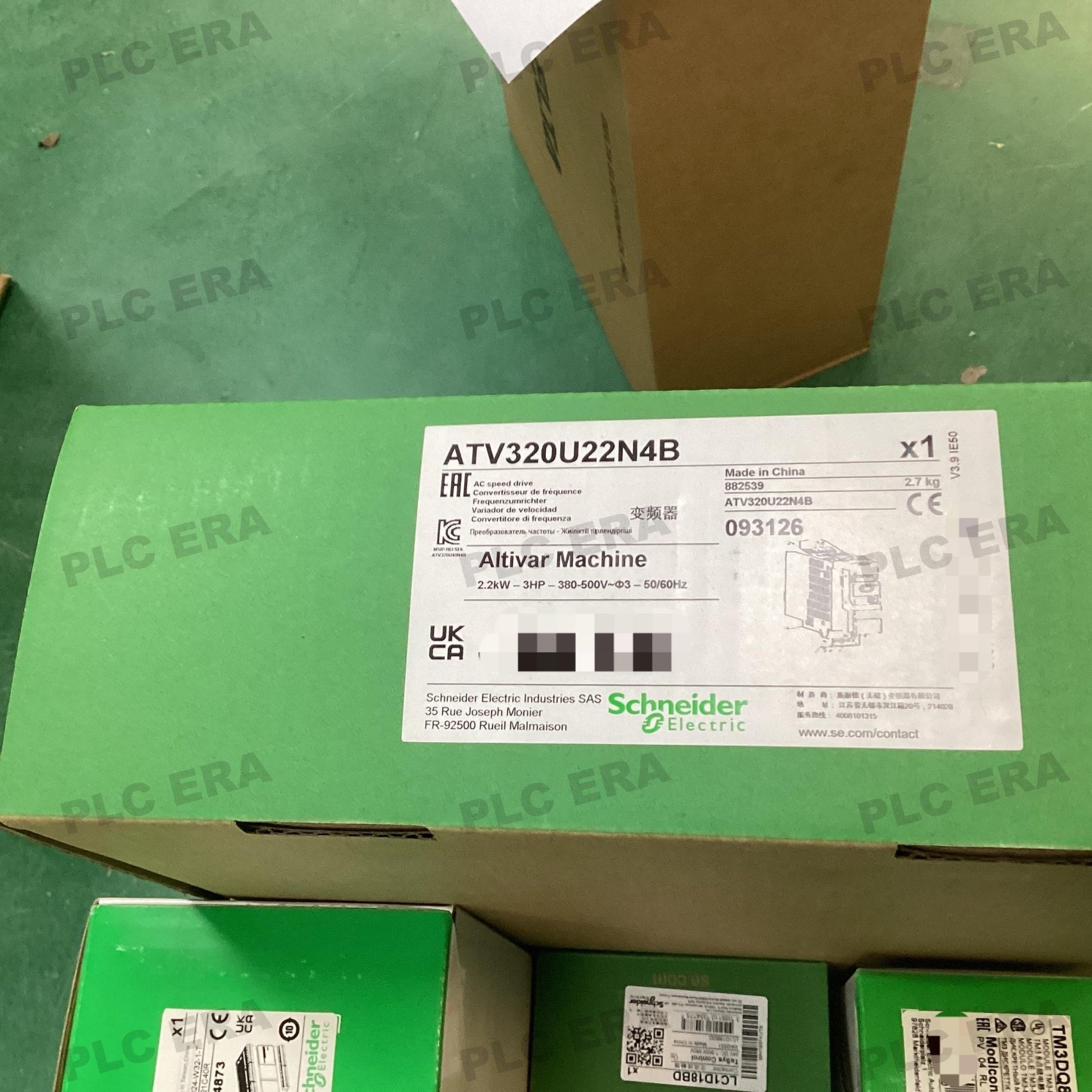 PLC ERA warehouse stocked with Original New Schneider Electric ATV320U22N4B and industrial automation modules ready for global shipping