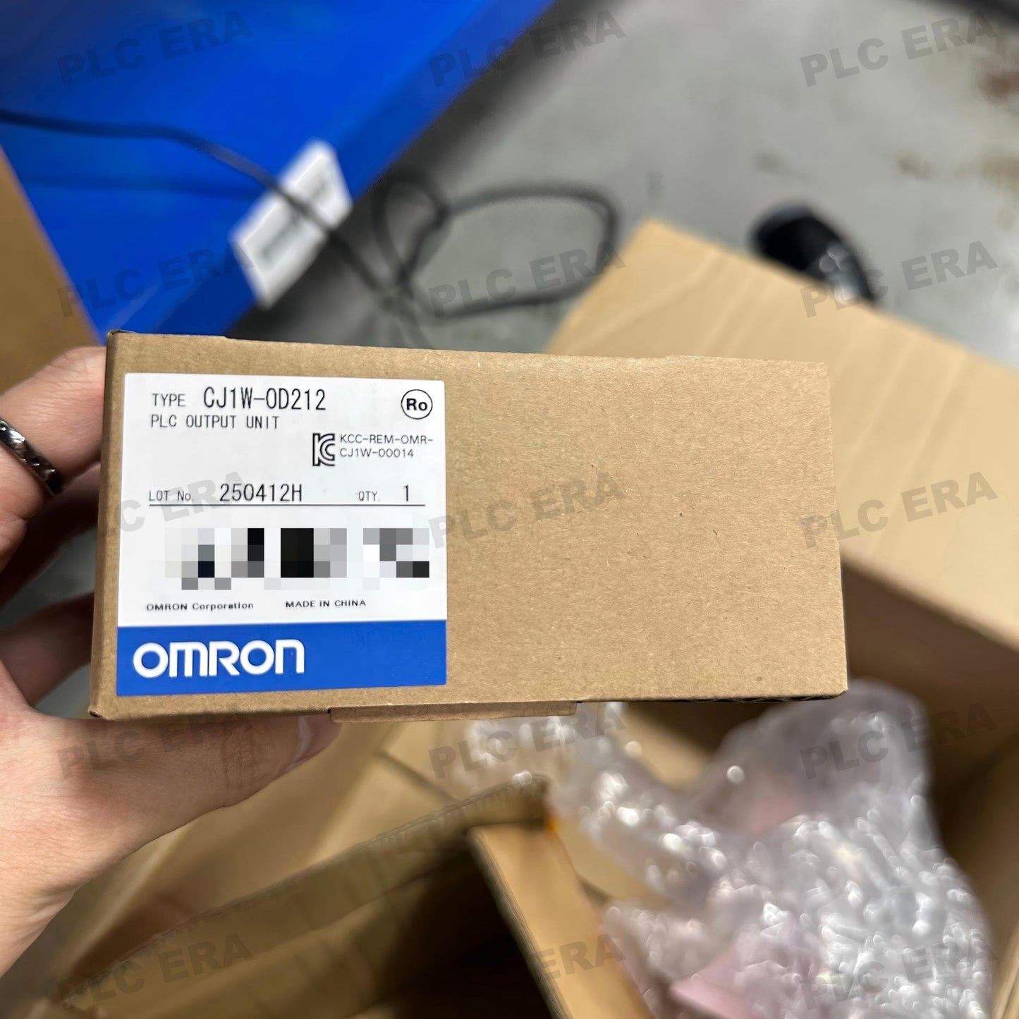 PLC ERA warehouse stocked with Original New Omron CJ1W-OD212 and industrial automation modules ready for global shipping