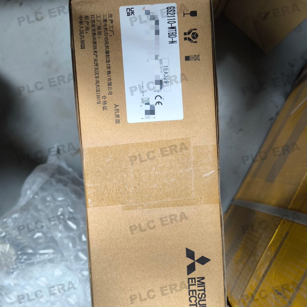 PLC ERA warehouse stocked with Original New Mitsubishi GS2110-WTBD-N and industrial automation modules ready for global shipping