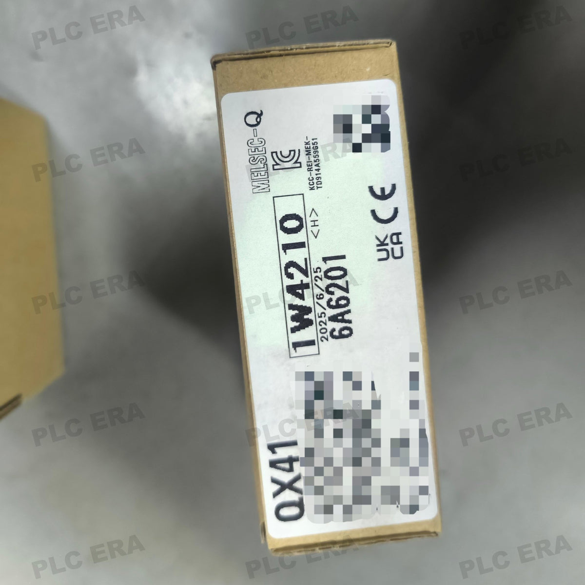 PLC ERA warehouse stocked with Original New Mitsubishi Electric QX41 and industrial automation modules ready for global shipping