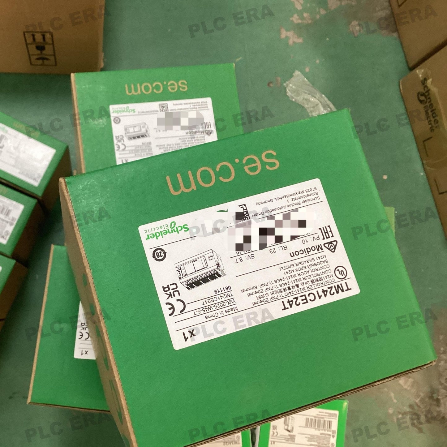 PLC ERA warehouse stocked with Original New Schneider Electric TM241CE24T and industrial automation modules ready for global shipping