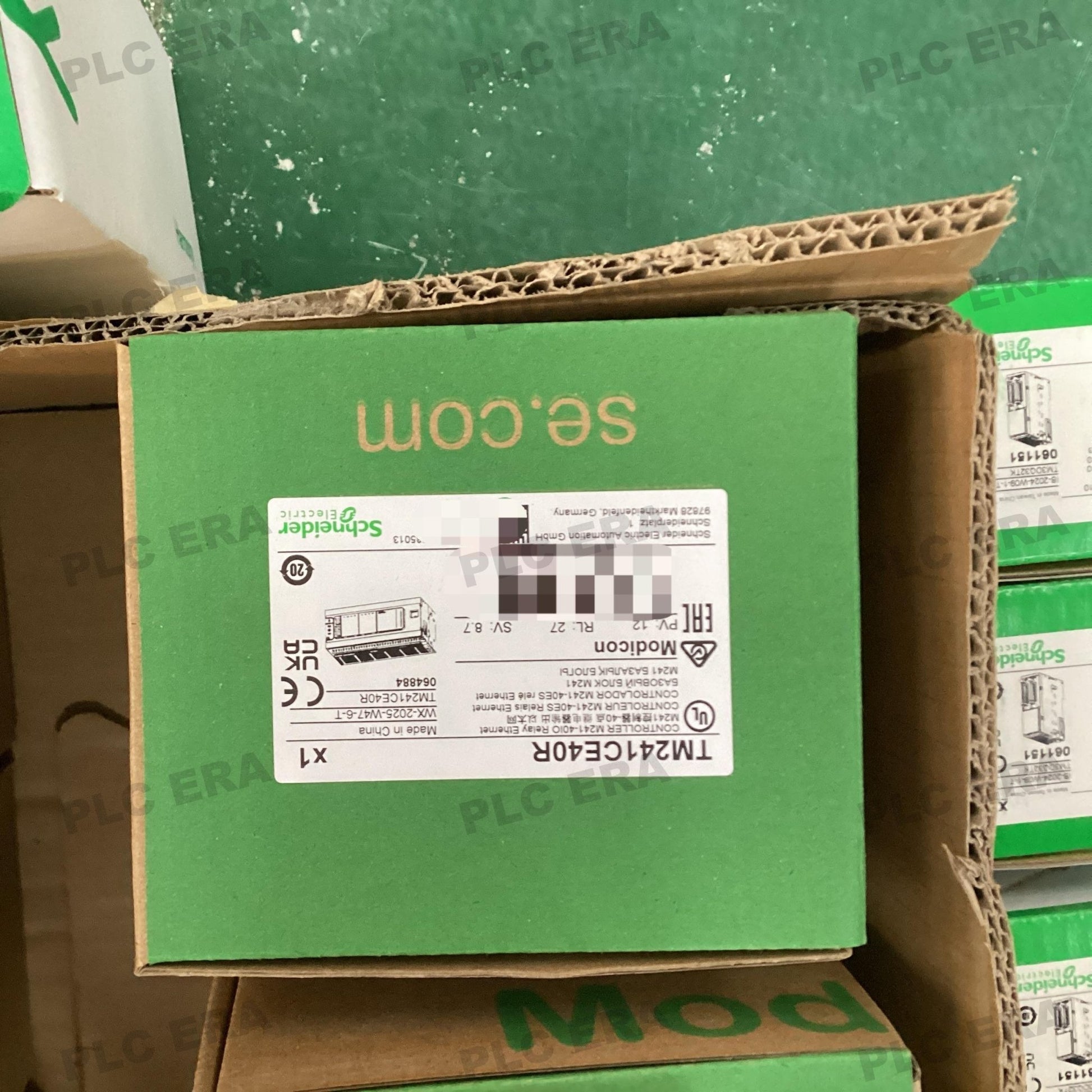 PLC ERA warehouse stocked with Original New Schneider Electric TM241CE40R and industrial automation modules ready for global shipping