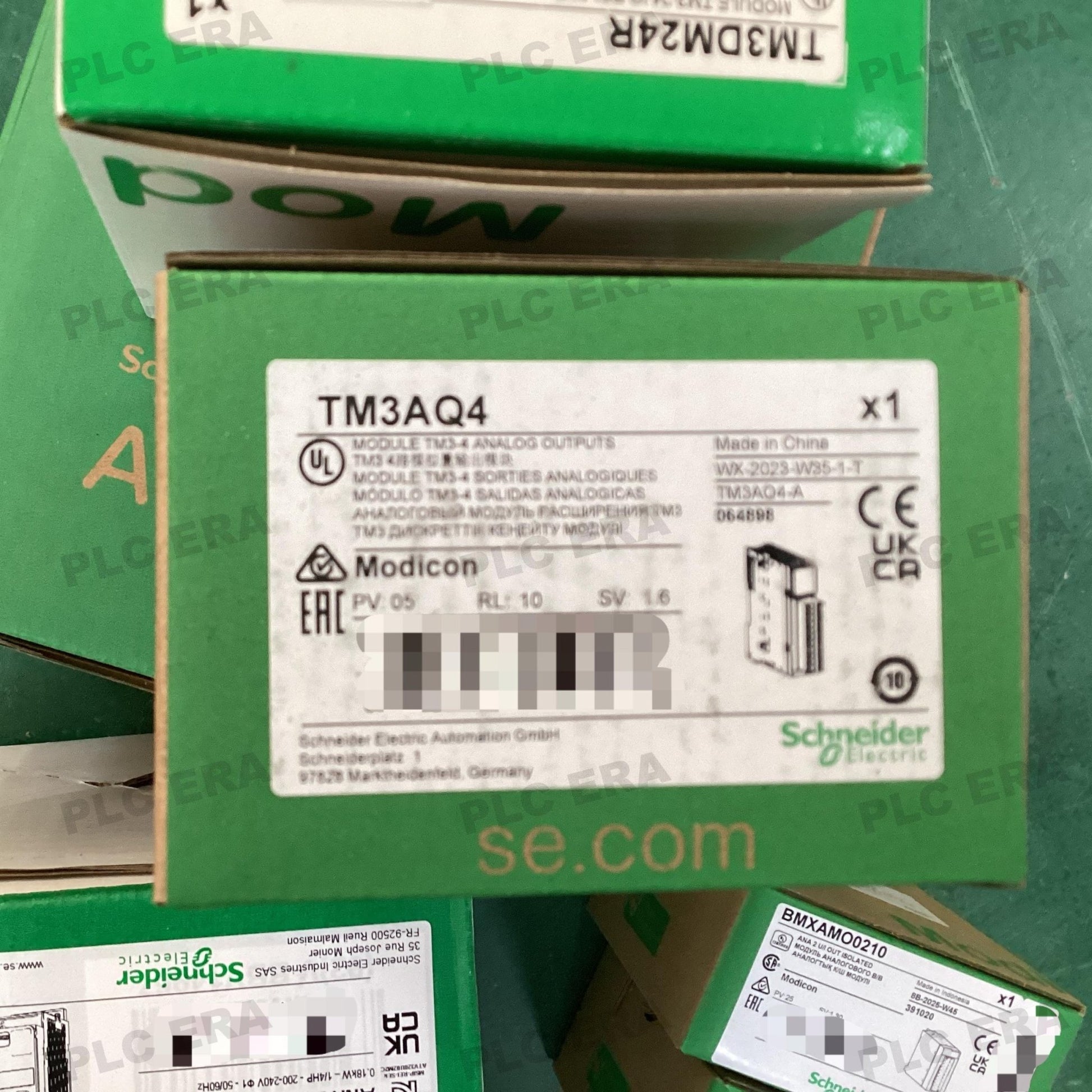 PLC ERA warehouse stocked with Original New Schneider Electric TM3AQ4 and industrial automation modules ready for global shipping