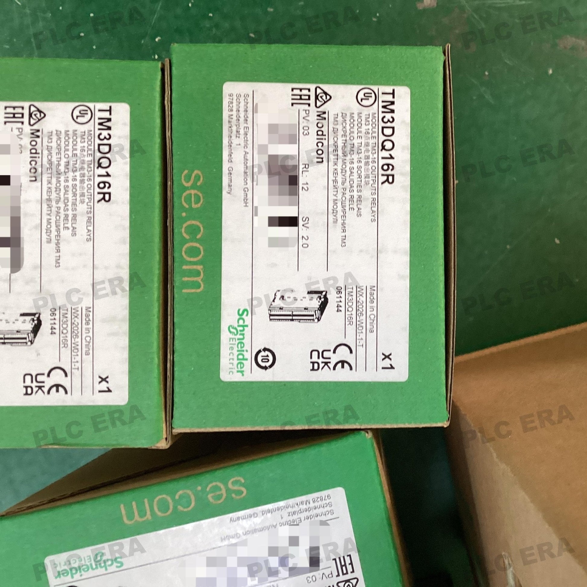 PLC ERA warehouse stocked with Original New Schneider Electric TM3DQ16R and industrial automation modules ready for global shipping