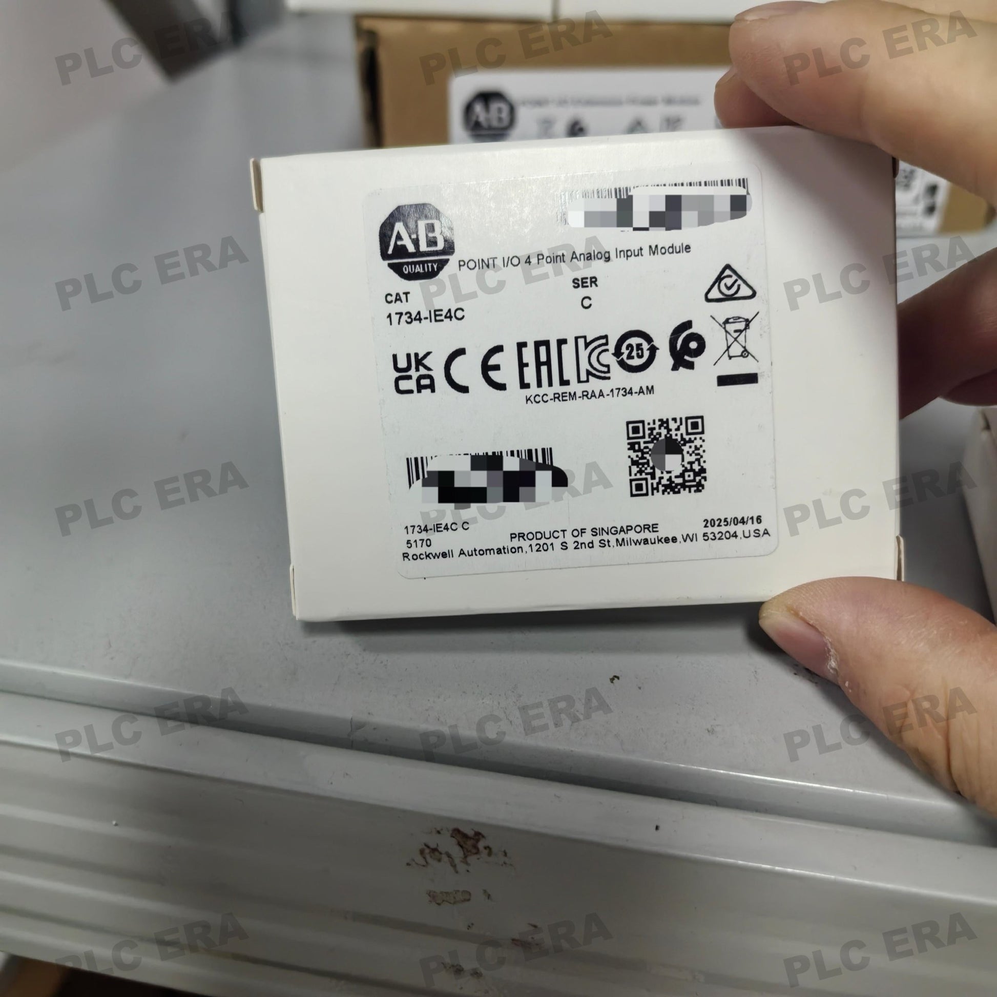 Front view of Allen‑Bradley 1734‑IE4C showing module status LEDs and terminal base