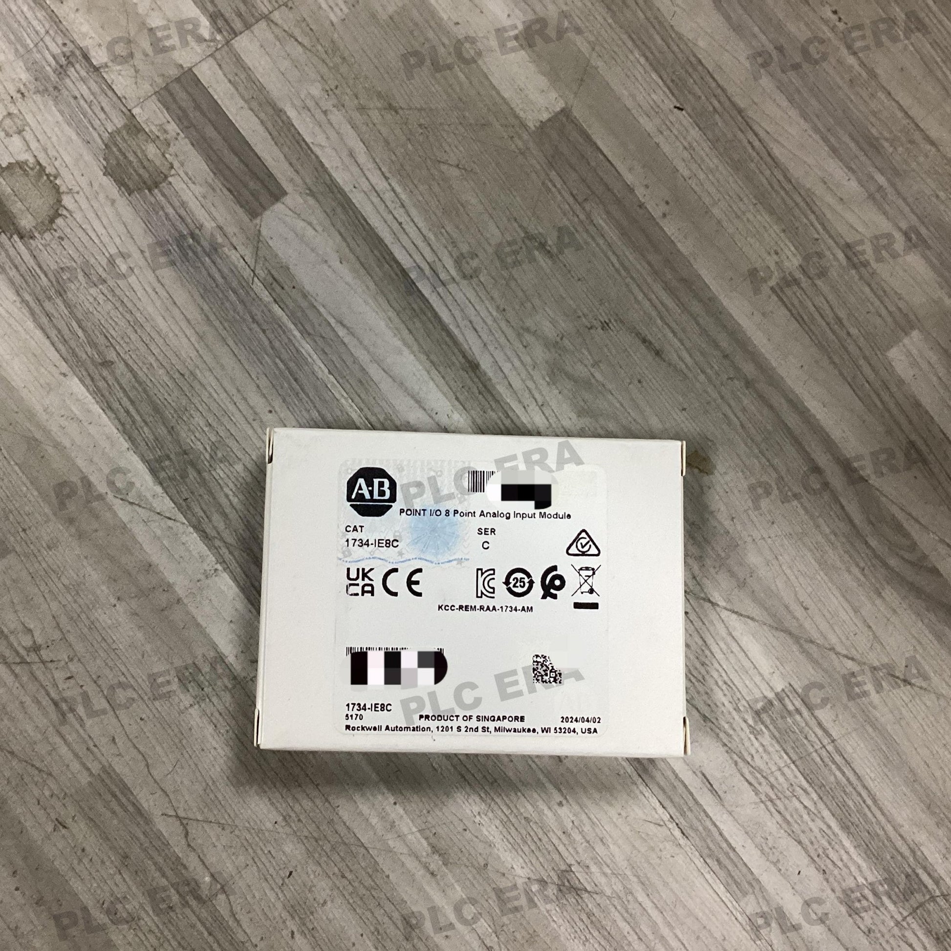 Front view of Allen‑Bradley 1734‑IE8C showing module status LEDs and keyswitch position
