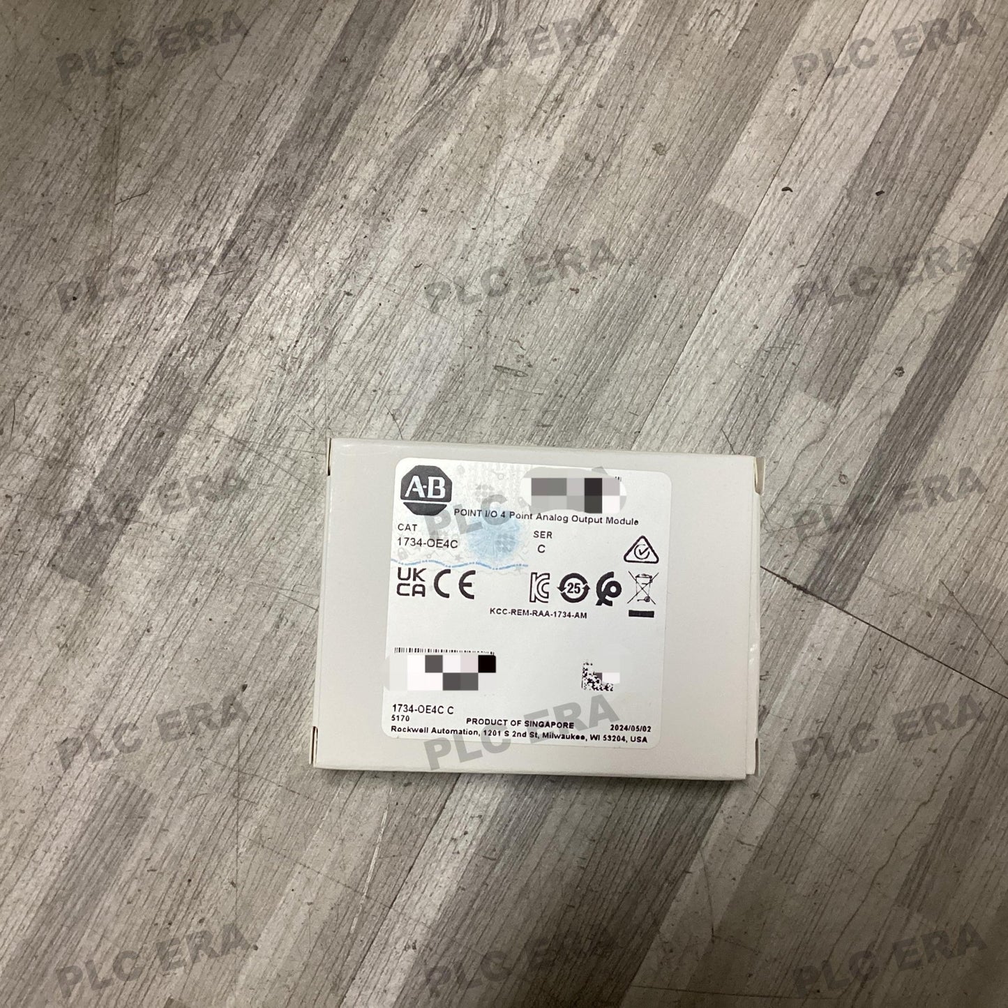Front view of Allen‑Bradley 1734‑OE4C showing module status and channel LEDs