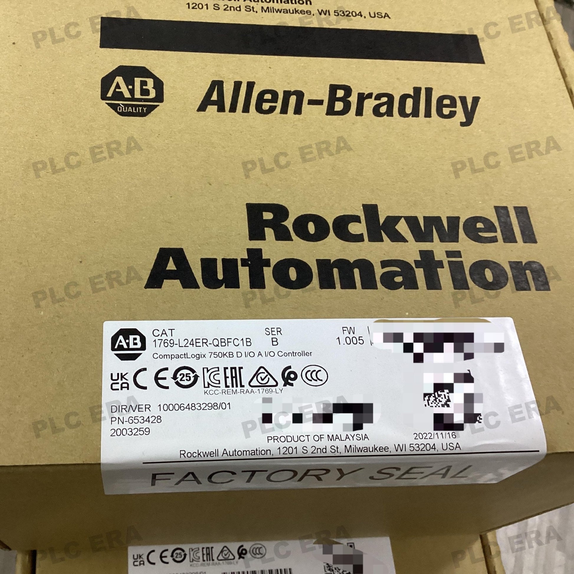 Front view of Allen‑Bradley 1769‑L24ER‑QBFC1B showing digital and analog I/O terminals, communication ports, and SD card slot