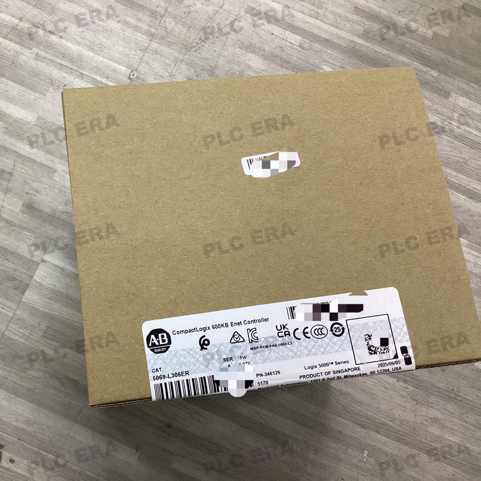 Front view of Allen‑Bradley 5069‑L306ER showing status LEDs, SD card slot, mode switch, and reset button