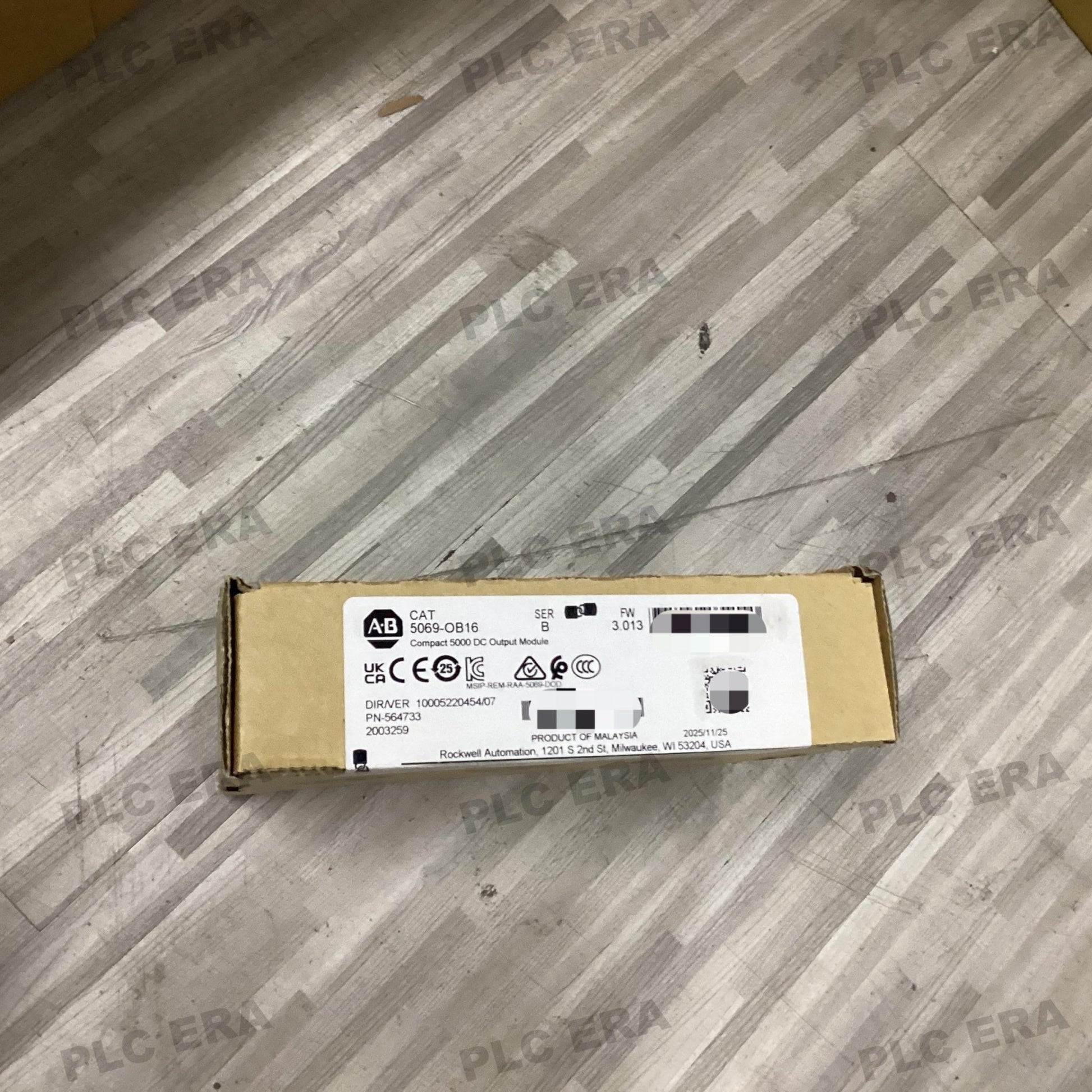 Front view of Allen‑Bradley 5069‑OB16 showing terminal block and diagnostic LEDs