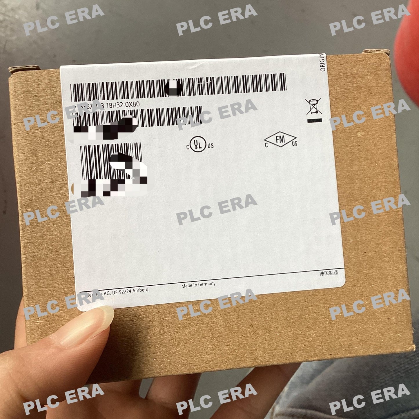 Front view of Siemens S7-1200 SM 1223 module 6ES7223-1BH32-0XB0 showing input and output terminals